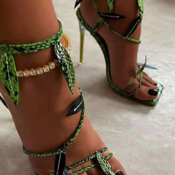 Green snake high heeled sandals